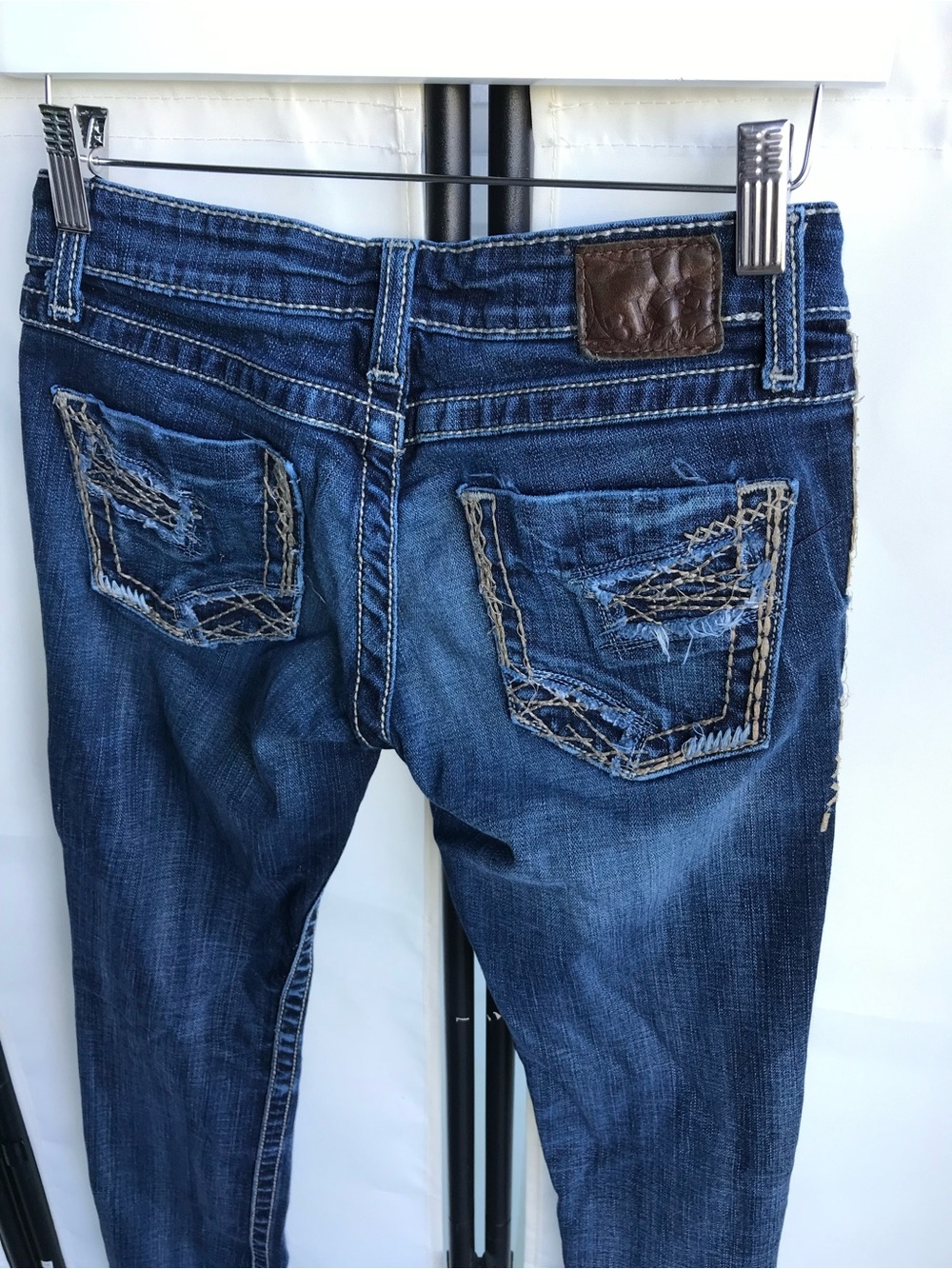 BKE Distressed blue jeans.